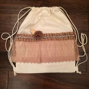 Gorgeous handmade lace drawstring bag with flower
